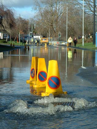 road closed as water pressure increases