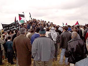 Above: Villagers from Beit Sourik and neighboring towns rally against the Apart