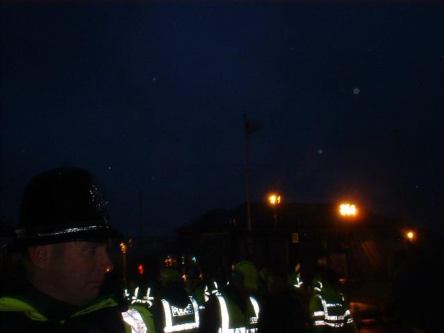 More police, and a Yankee flag in the distance