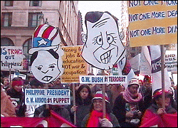 Filipino contingent illustrates relationship between Bush and Arroyo