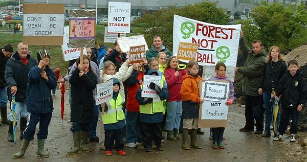 More posing, at the top of the entrance road to the site