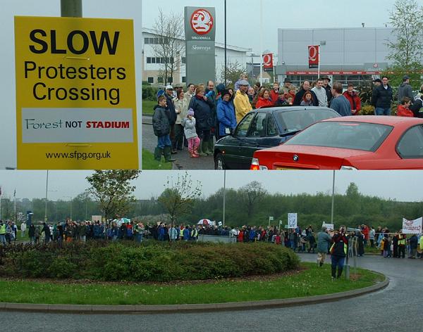 Protestors slowly cross the road in large numbers (close ups)