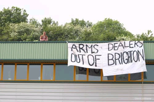 Banner drop: “Arms dealers out of Brighton”