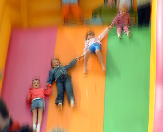 Children enjoy the slide.