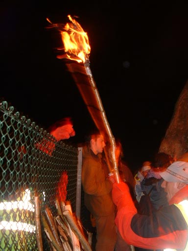 ...so no procession around the stones... but is this a torch or a big spliff?