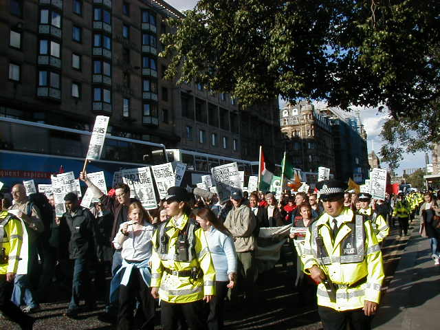 Marching along Princes Street, Edinburgh's main shopping street.