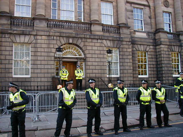 Police outside the house of First Minister Jack McConnell
