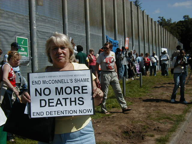Scottish National Party MSP Sandra White with a placard.