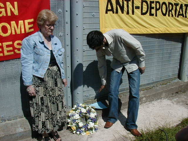 Laying a wreath for the recent suicide victim.