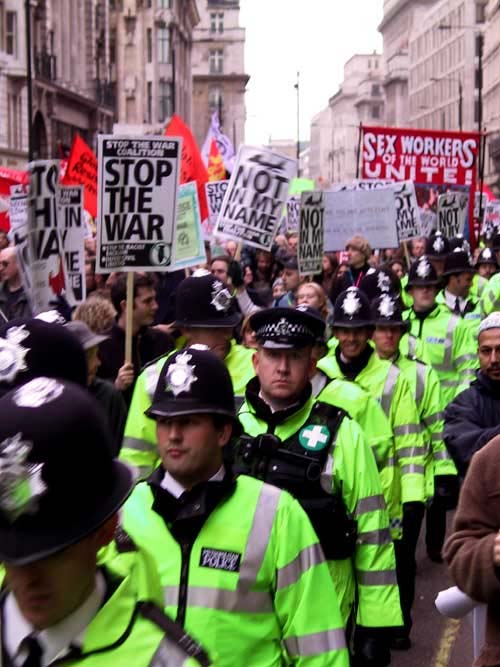 Police_returned_to_london_by_protestors