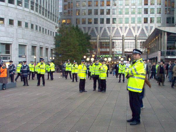 The police look on in trepidation