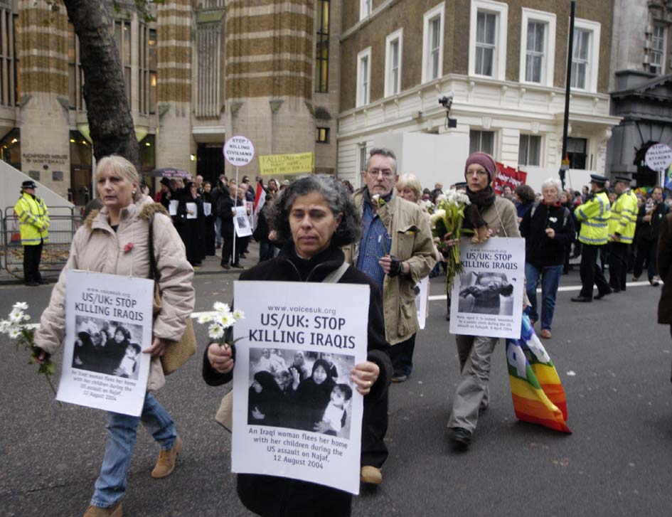 Iraqi exile Haifa Zangana lays flowers at Cenotaph