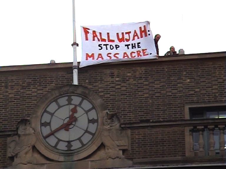 Protestors on the roof of the Guildhall (City Council)