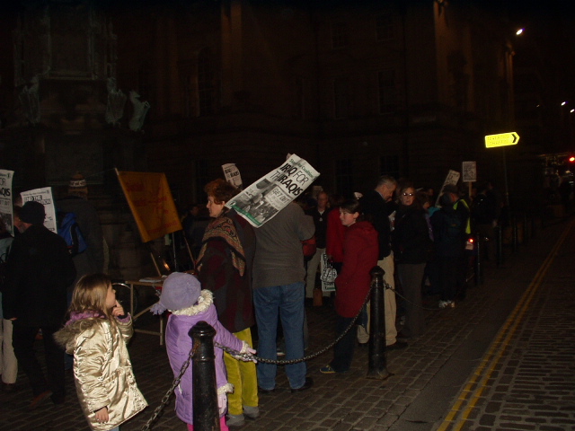 Crowd gathering at West Parliament Square in Edinburgh.