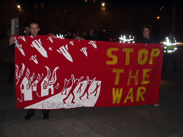 Edinburgh Stop the War banner outside the Scottish Parliament.