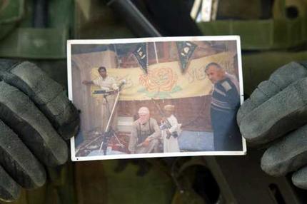 snap shot found in a safe box in Falluja during a search by aggrtessors