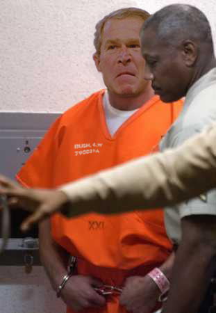 First photo released of President Bush after his arrest. (c) pkj
