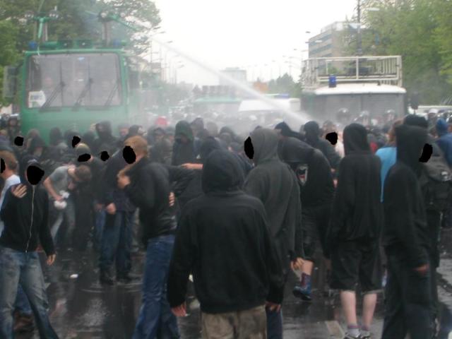 ...the cops shoot the antifascists with water-canons...