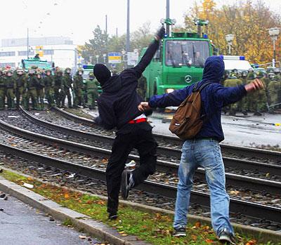 ...thousands fight the cops on the streets...