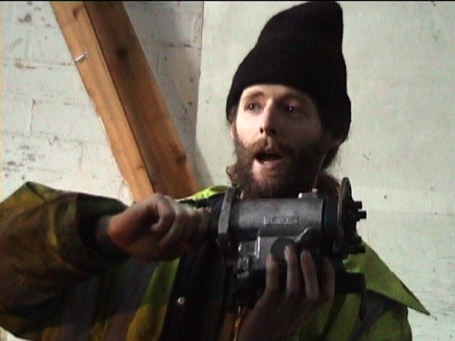 Ian explaining a bio-diesel car conversion while it's happening