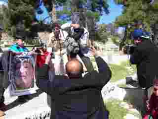 Grnadfather Prays for the sanctity of his land