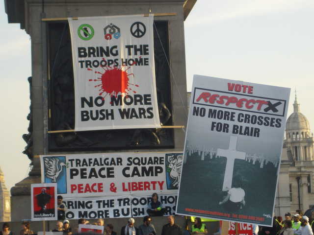 Placards hoisted at rally in Trafalgar Square
