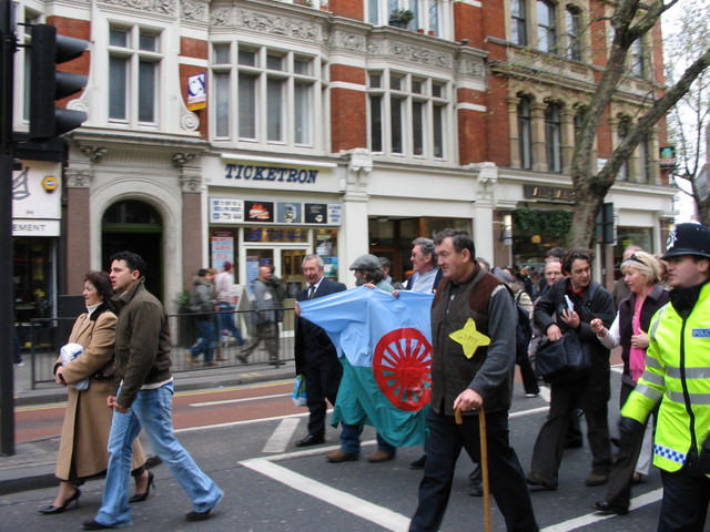 The Roma flag carried as a banner
