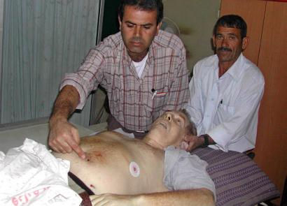 Iain Hook's body shot and killed because the IDF soldiers blocked the ambulance