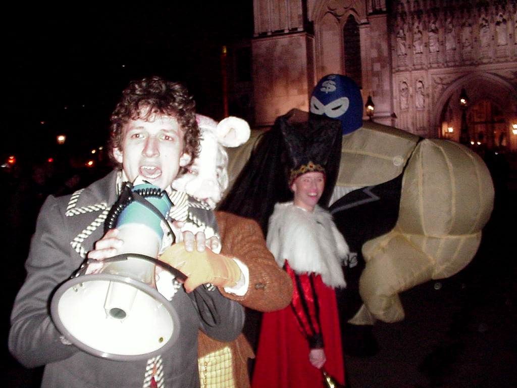 … and Lewis Carrol, the Mad Hatter steals the White Rabbit's megaphone, …