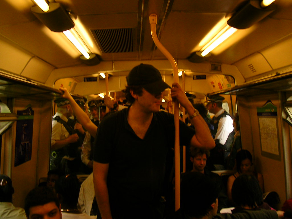 Police and Protestors packed in on the train to Hackney