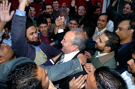 George returns to Brick lane to thank his supporters.