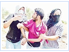 Uncover two undercover Israeli secret service personal arresting a person at the