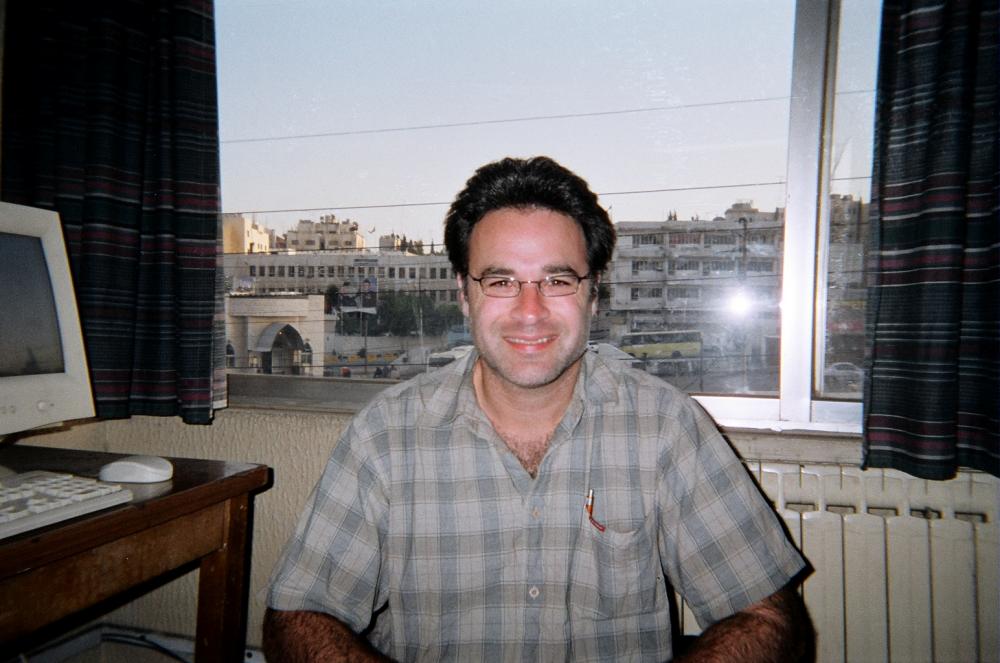 Dahr Jamail with Amman in the background.