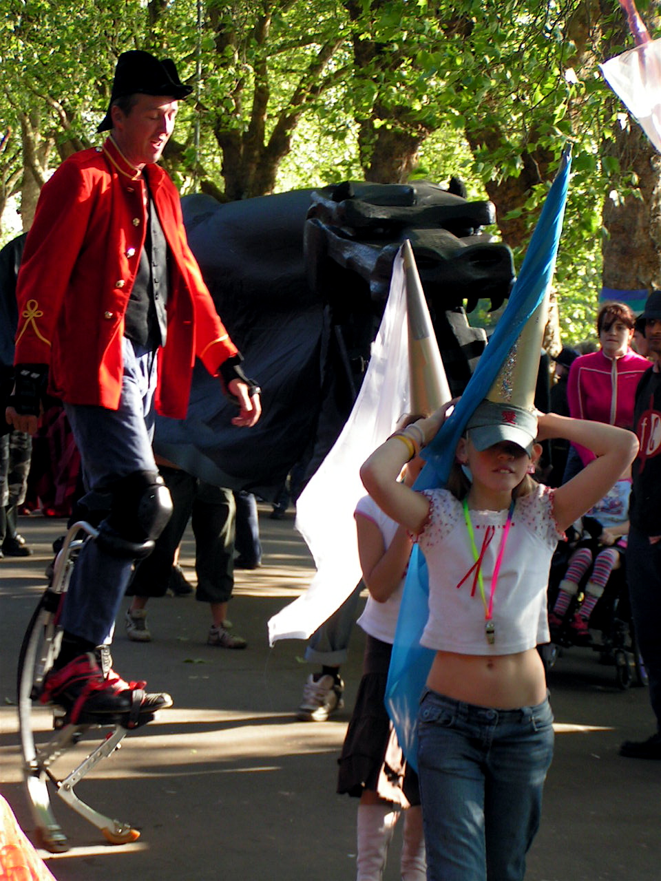 Procession B - rococo recumbent + hi-tech stilt walker