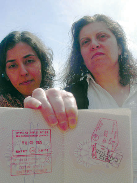 Salma Iqbal and Sandra Kane with a passport