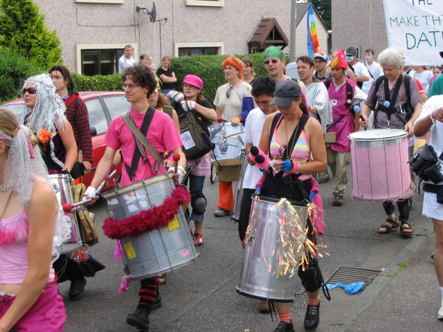 Residents come out of their houses to hear the samba