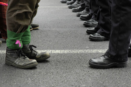 To go toe to toe with the police