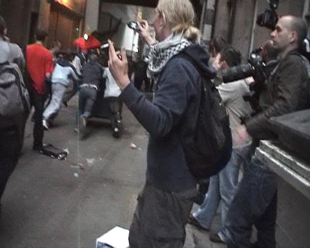 Shoving the dumpster at Police lines