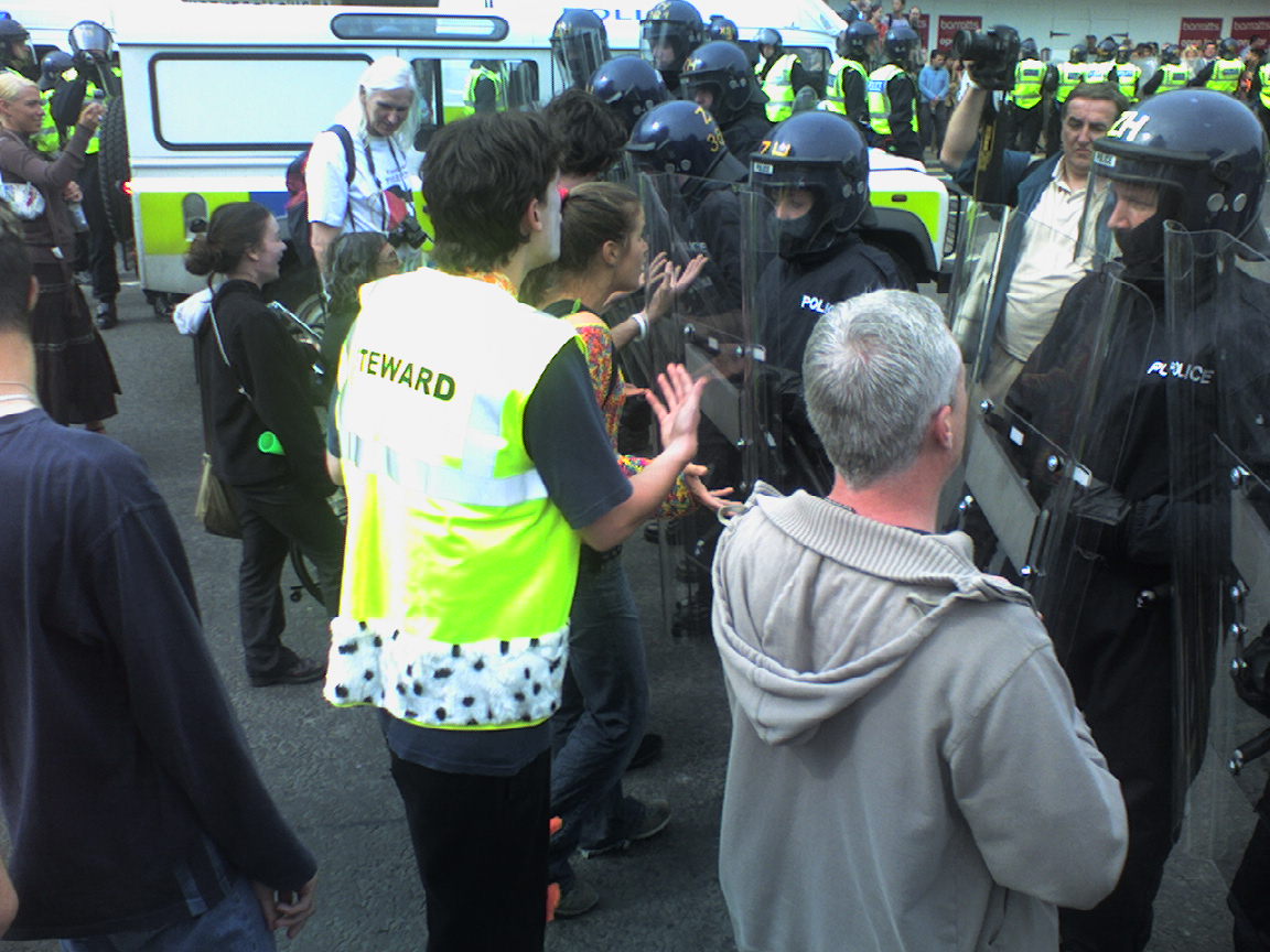 Police pushing protesters back. 4:20pm