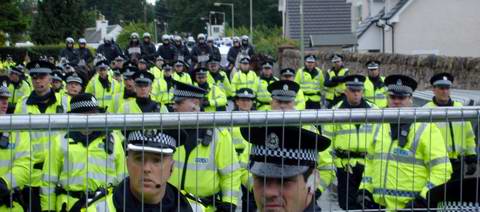 Wall of oppression with fence