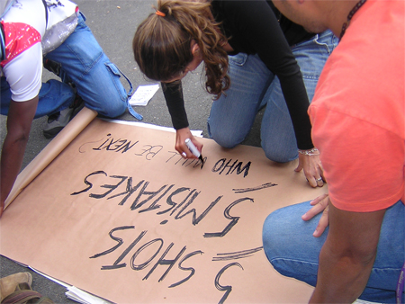 People improvising placards