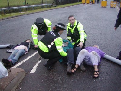 Activists used lock-on tubes to block the road