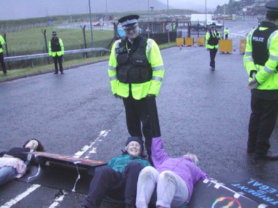 Police allowed traffic to pass close to activists until 3 moved to block road