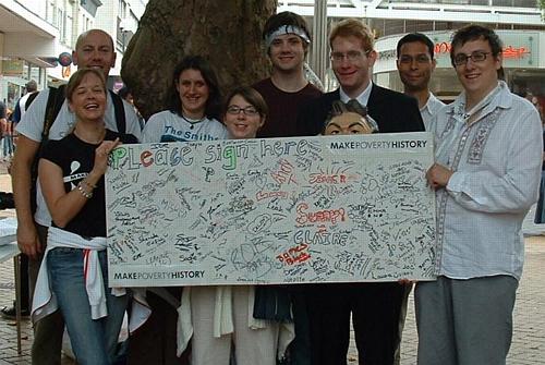 The MPH team proudly display their board full of signatures