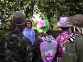 Clowns paying attention to tour guide