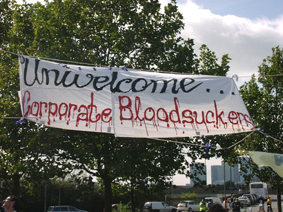 Saying "Unwelcome Corporate Bloodsuckers"