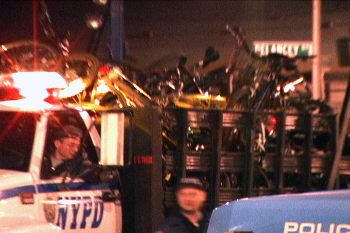 police confiscate bicycles in March 2005 (video still)