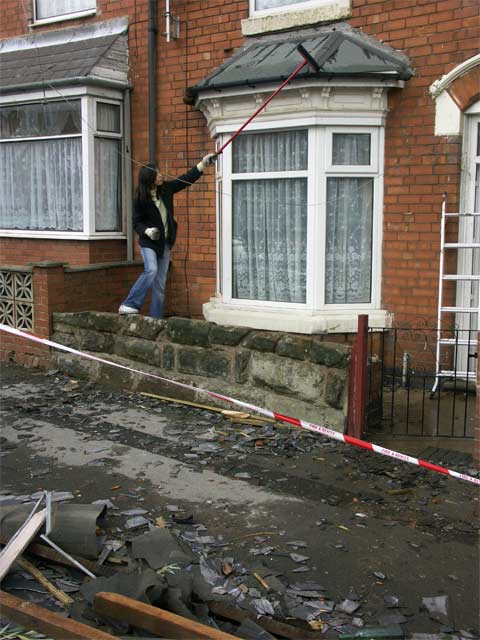 sweeping up yet more asbestos tiles :(