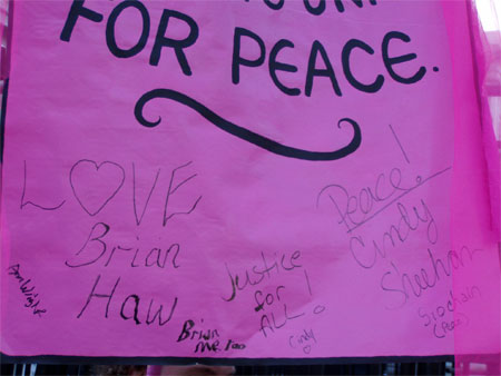 the pink banner signed