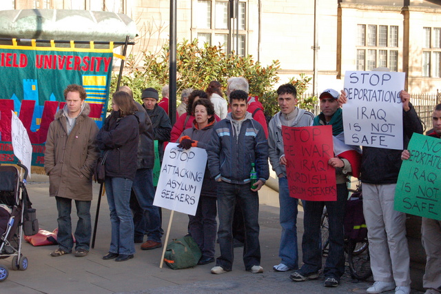 AUT banner on the protest